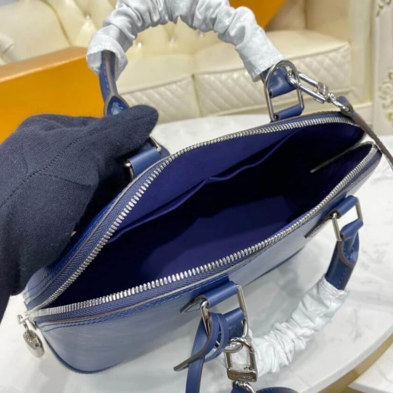 Replica bags lv Handle: S Louis Vuitton Epi Leather Alma PM Blue