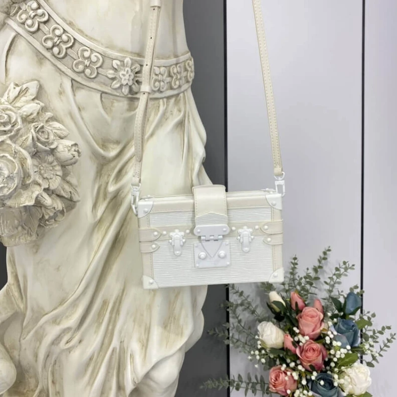 Louis vuitton locations Supremely Louis Vuitton Epi Leather Petite Malle White
