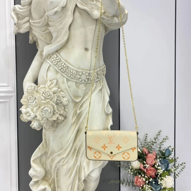 Lv belts replica Inside fl Louis Vuitton Félicie Pochette Cream   Saffron