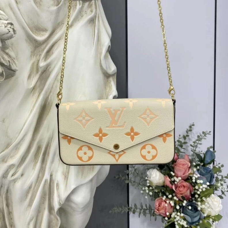 Lv belts replica Inside fl Louis Vuitton Félicie Pochette Cream   Saffron