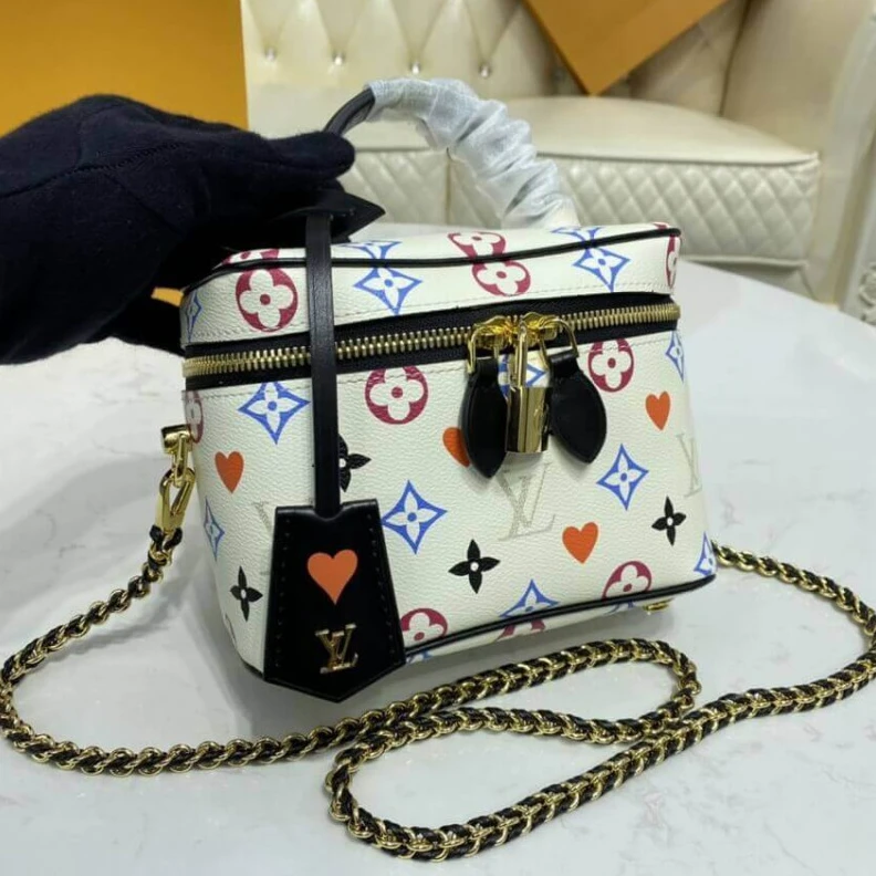 Replica bags lv Key bell Louis Vuitton Game On Vanity PM White