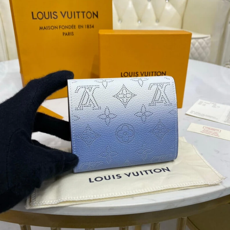 Replica bag 1 zipped Louis Vuitton Iris Compact Wallet in Blue Gradient Mahina Perforated Leather