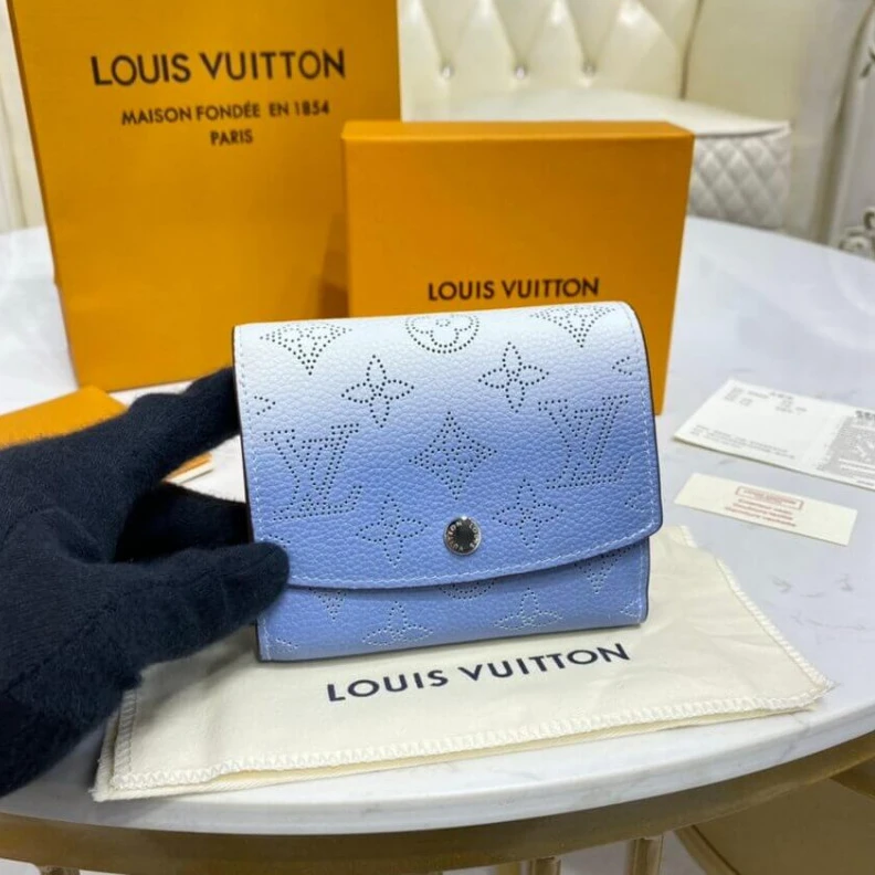 1 zipped Louis Vuitton Iris Compact Wallet in Blue Gradient Mahina Perforated Leather