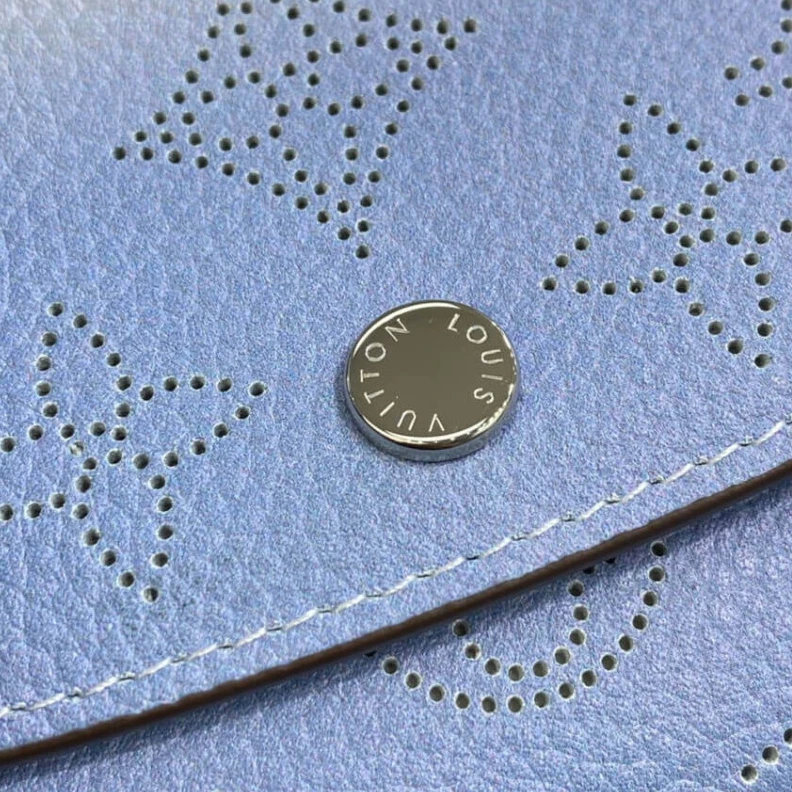 Replica bag 1 zipped Louis Vuitton Iris Compact Wallet in Blue Gradient Mahina Perforated Leather