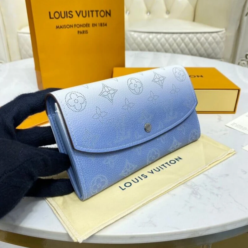 Louis vuitton locations 2 large c Louis Vuitton Iris Wallet in Blue Gradient Mahina Perforated Leather