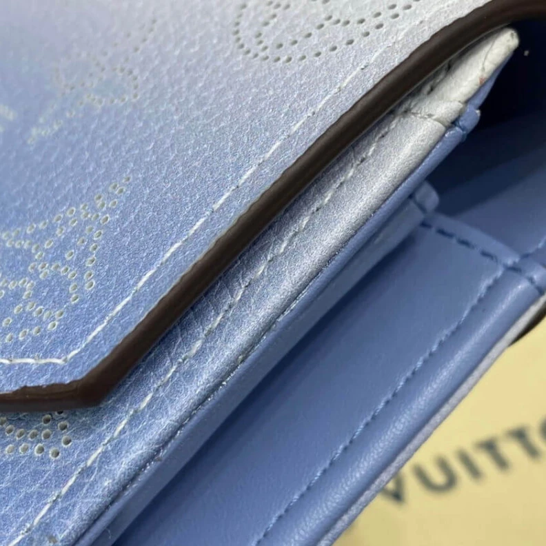 Louis vuitton locations 2 large c Louis Vuitton Iris Wallet in Blue Gradient Mahina Perforated Leather