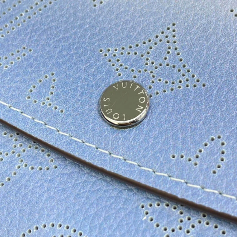 Louis vuitton locations 2 large c Louis Vuitton Iris Wallet in Blue Gradient Mahina Perforated Leather