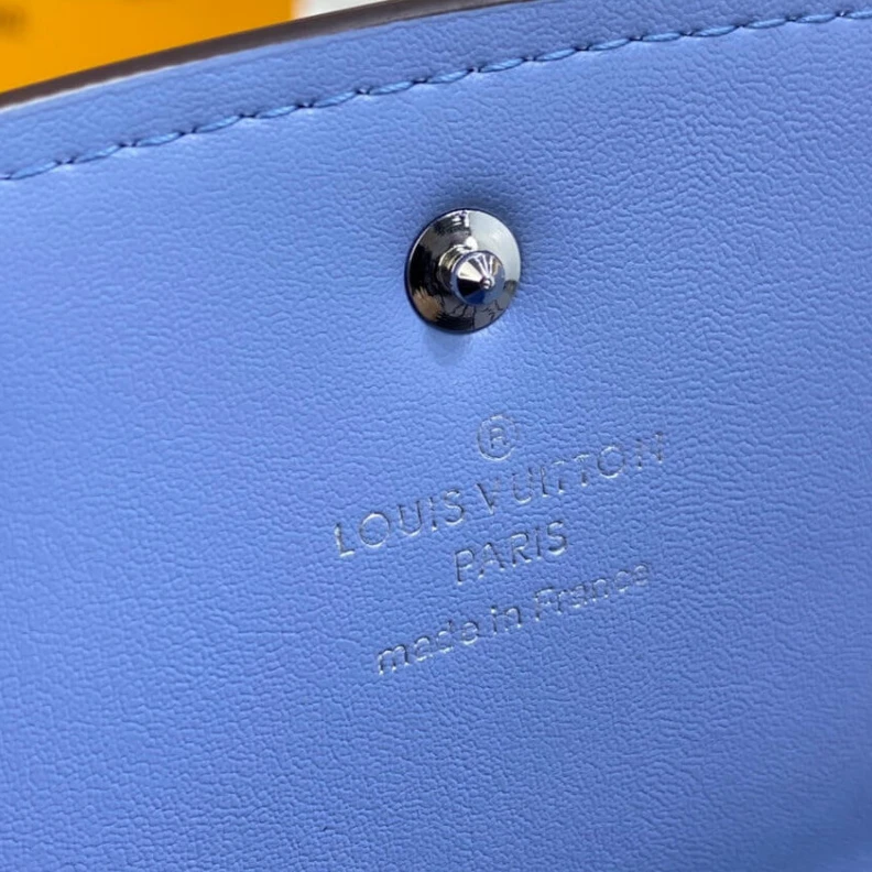 Louis vuitton locations 2 large c Louis Vuitton Iris Wallet in Blue Gradient Mahina Perforated Leather