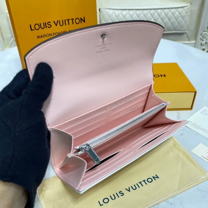 Replica bags lv 12 card s Louis Vuitton Iris Wallet in Pink Gradient Mahina Perforated Leather