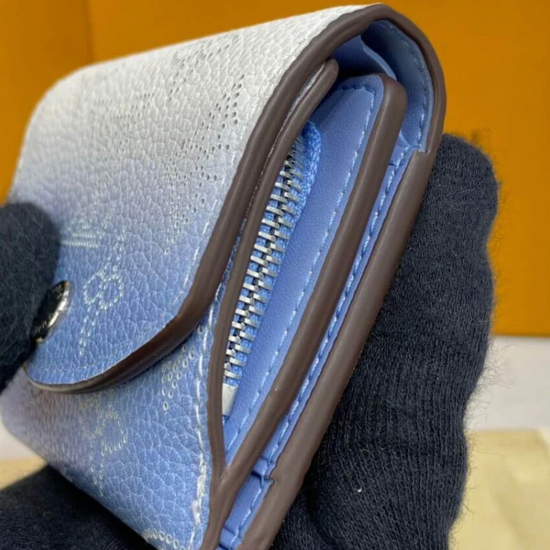 Replica bag Zipped co Louis Vuitton Iris XS Wallet in Blue Gradient Mahina Perforated Leather
