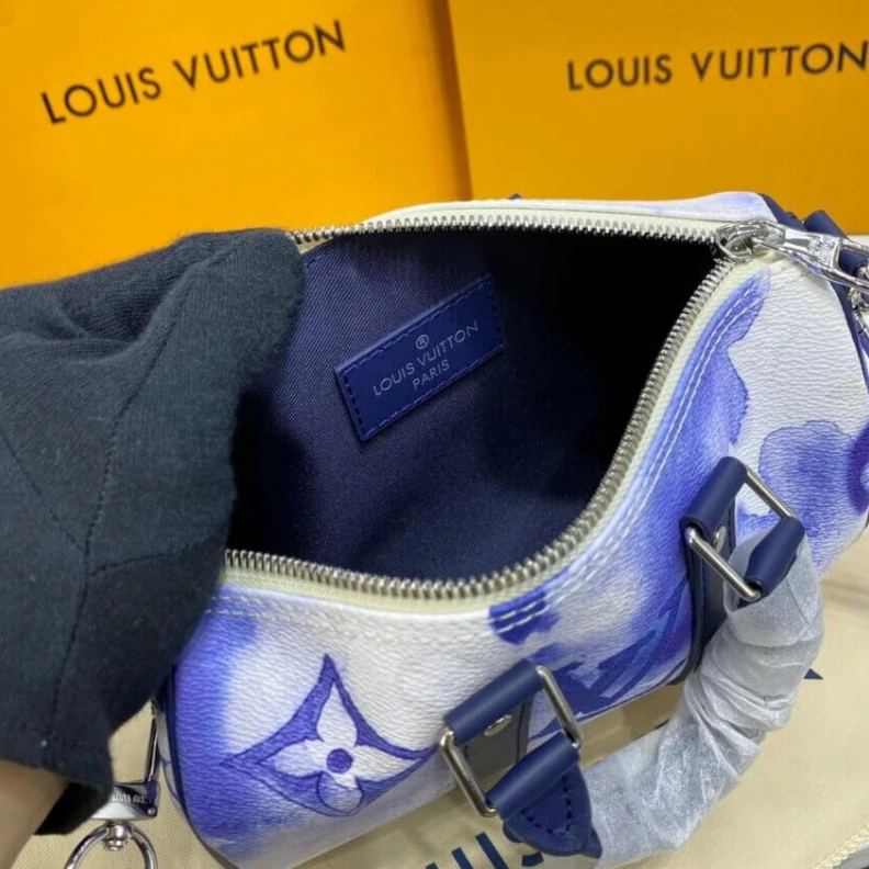 Louis vuitton locations Zip closu Louis Vuitton Keepall XS White
