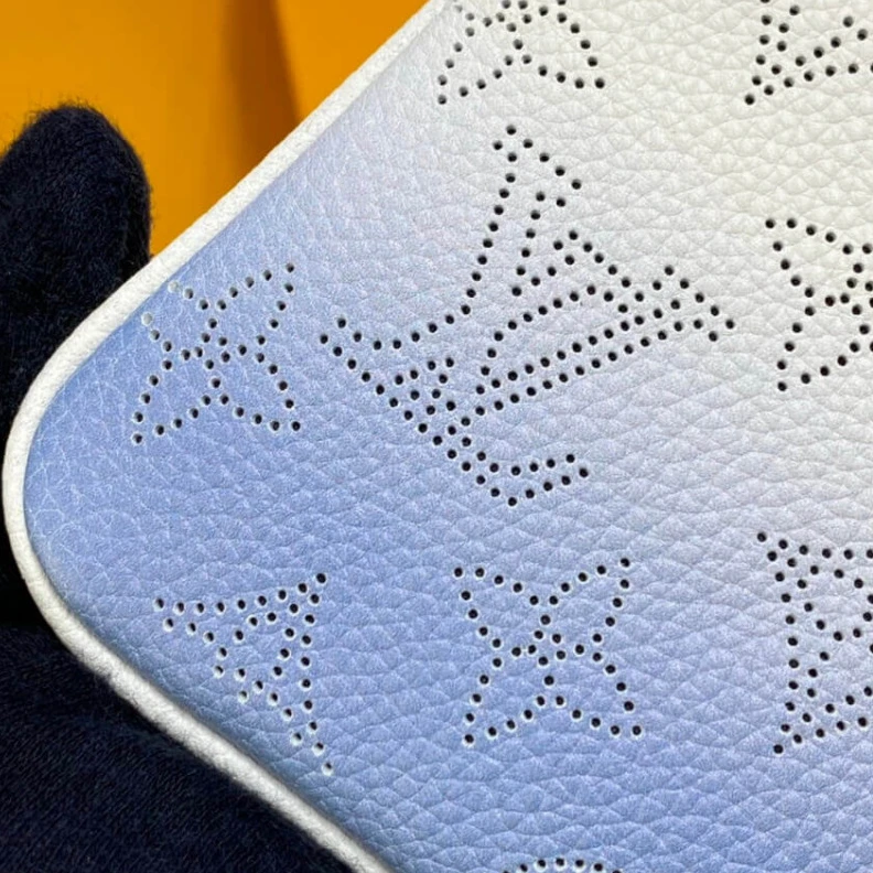 Louis vuitton locations Microfibe Louis Vuitton Key Pouch in Blue Gradient Mahina Perforated Leather