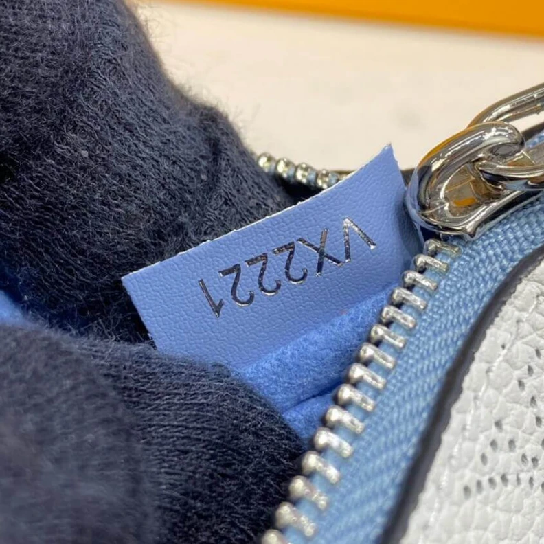 Louis vuitton locations Microfibe Louis Vuitton Key Pouch in Blue Gradient Mahina Perforated Leather