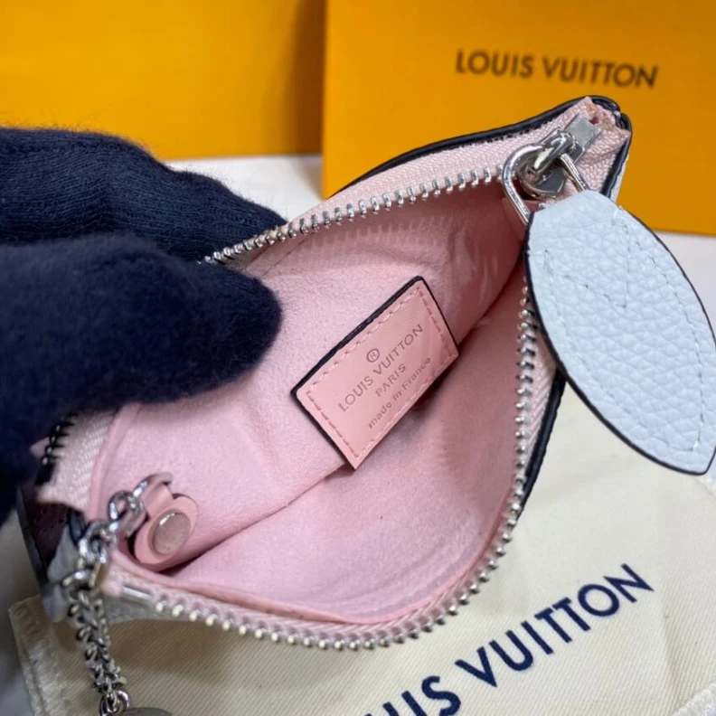 Mythick Key ring Louis Vuitton Key Pouch in Pink Gradient Mahina Perforated Leather