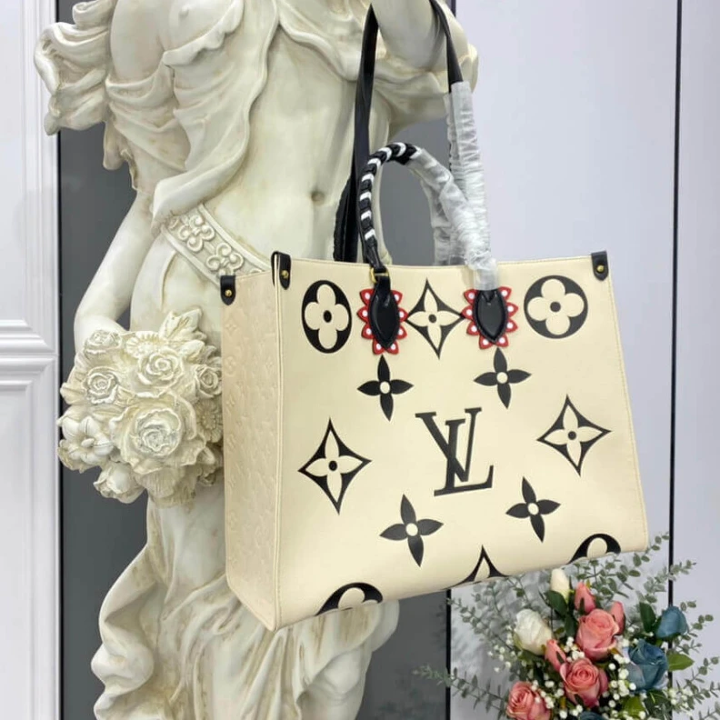Louis vuitton locations Embossed Louis Vuitton LV Crafty OnTheGo GM Creme Black
