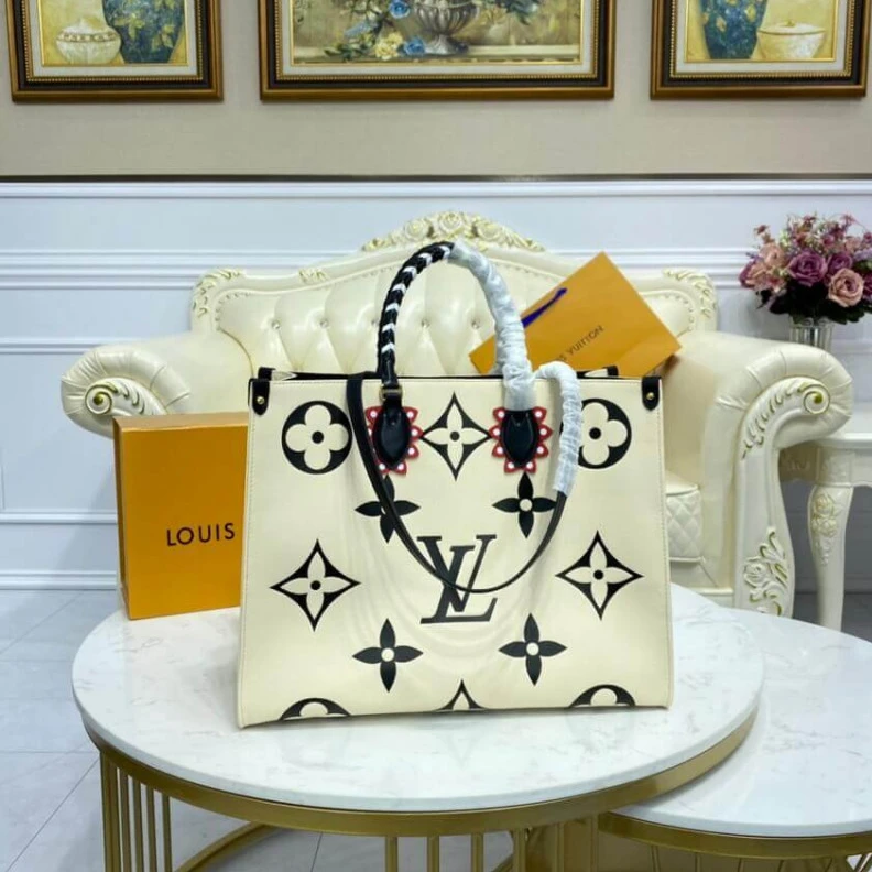 Louis vuitton locations Embossed Louis Vuitton LV Crafty OnTheGo GM Creme Black