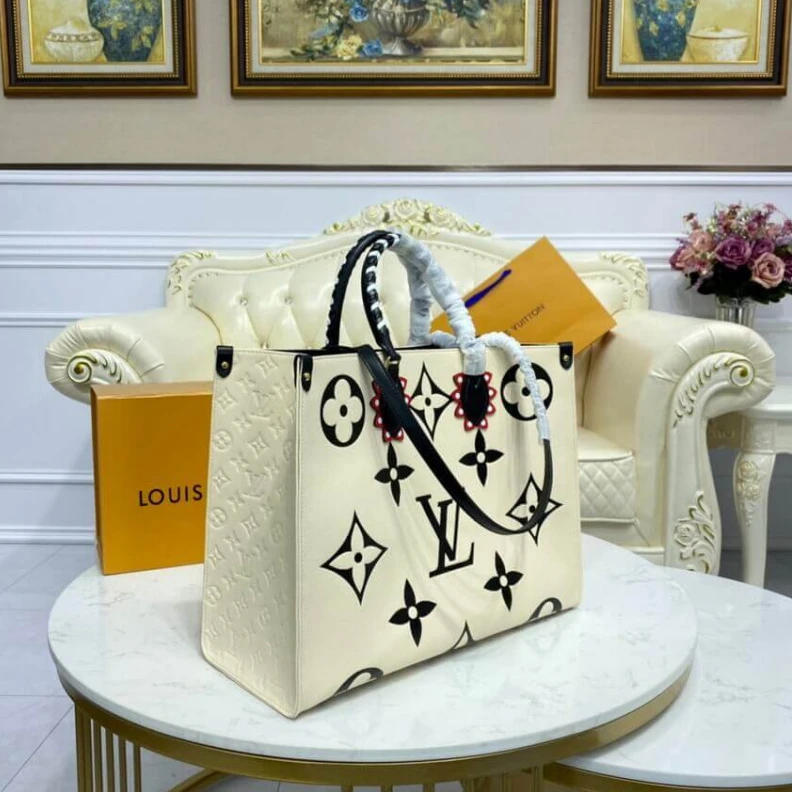 Louis vuitton locations Embossed Louis Vuitton LV Crafty OnTheGo GM Creme Black