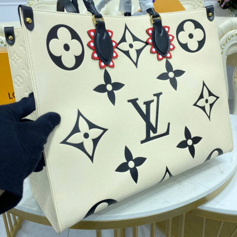 Louis vuitton locations Embossed Louis Vuitton LV Crafty OnTheGo GM Creme Black