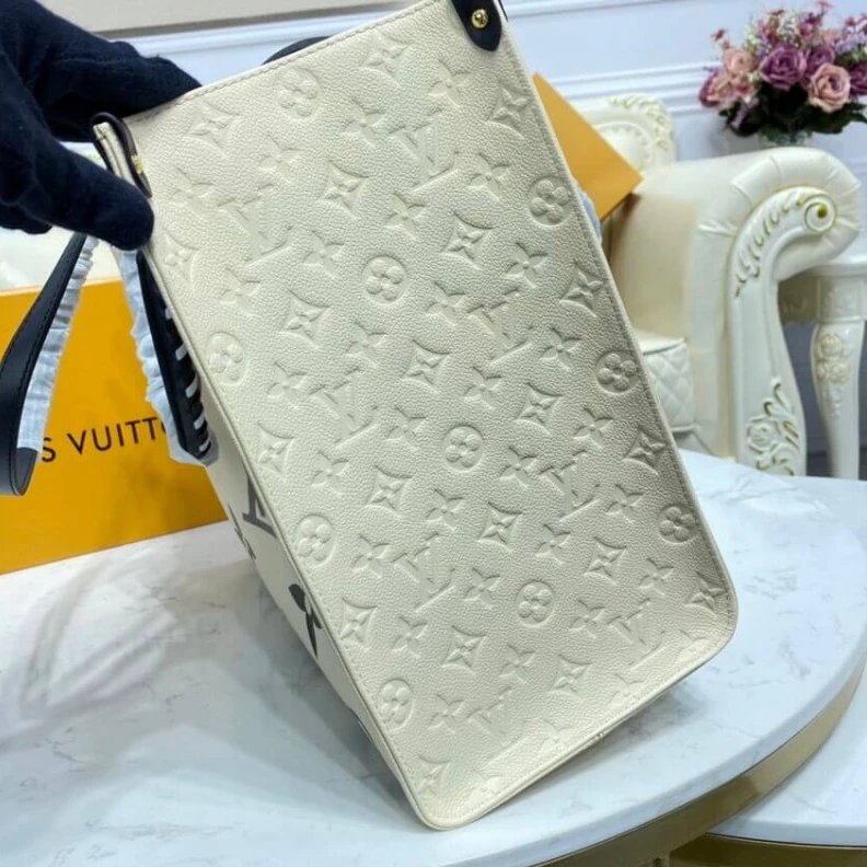 Louis vuitton locations Embossed Louis Vuitton LV Crafty OnTheGo GM Creme Black