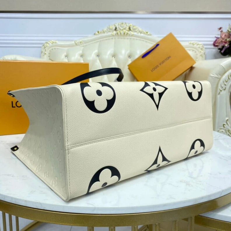 Louis vuitton locations Embossed Louis Vuitton LV Crafty OnTheGo GM Creme Black