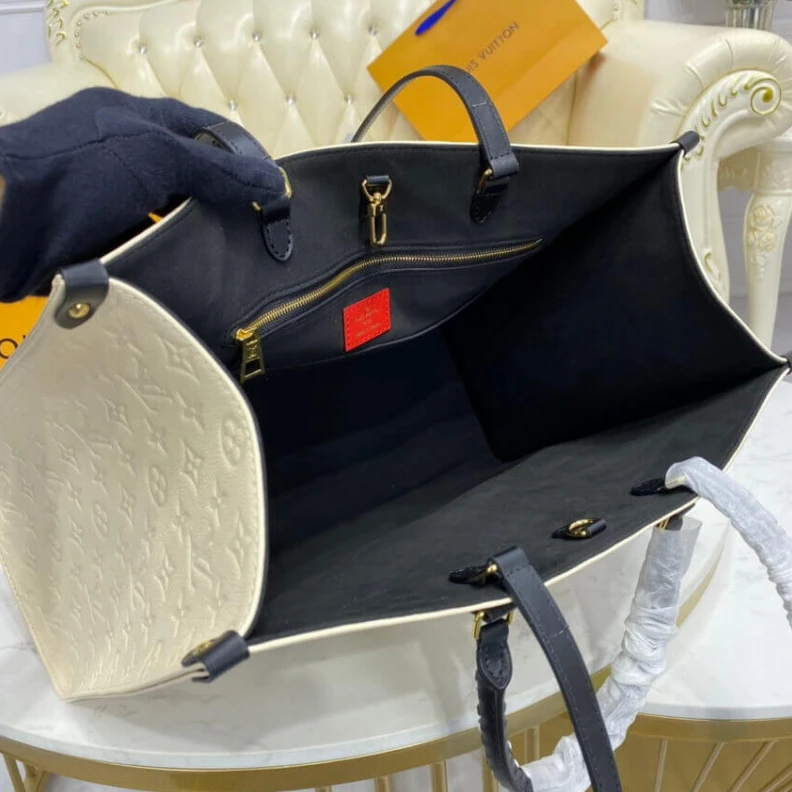 Louis vuitton locations Embossed Louis Vuitton LV Crafty OnTheGo GM Creme Black
