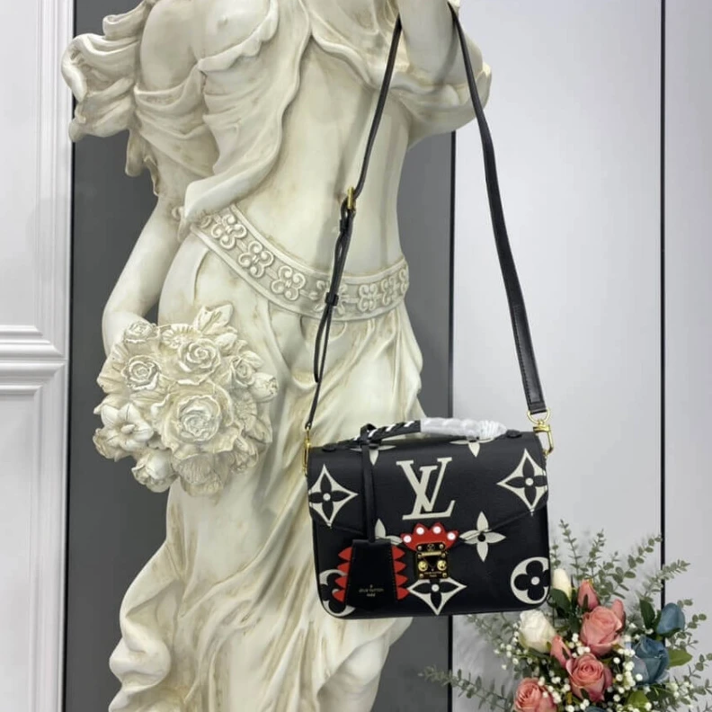 Louis vuitton locations Embossed Louis Vuitton LV Crafty Pochette Métis Black