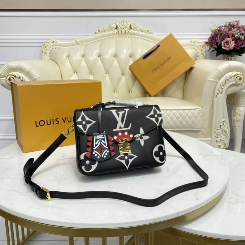 Louis vuitton locations Embossed Louis Vuitton LV Crafty Pochette Métis Black