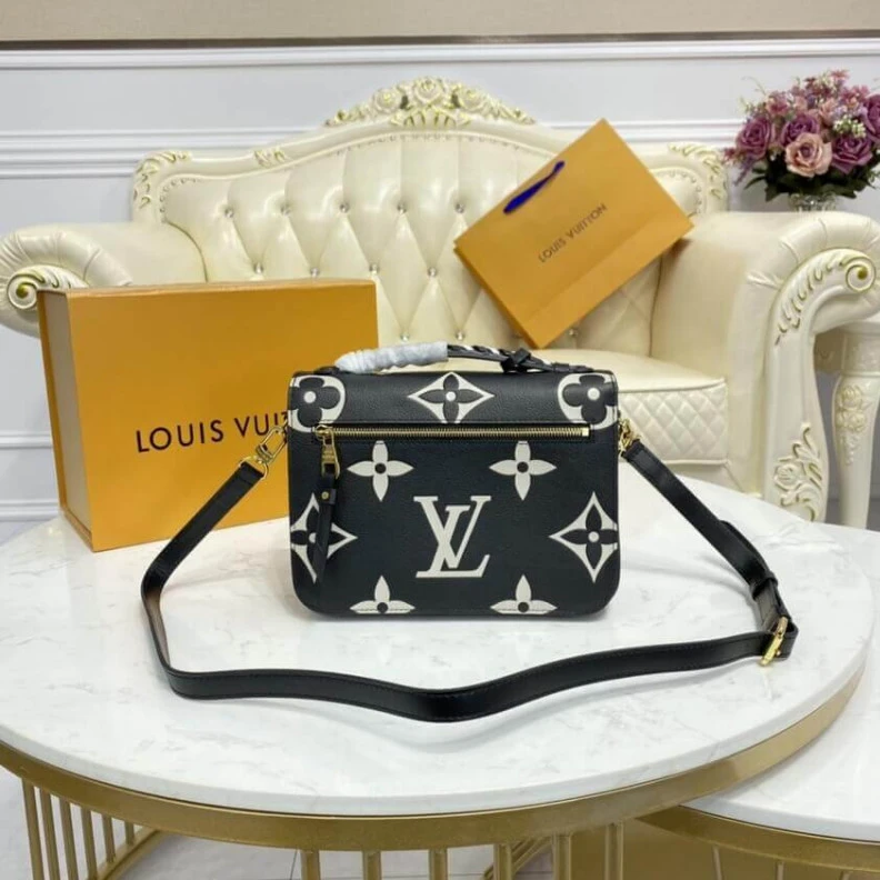 Louis vuitton locations Embossed Louis Vuitton LV Crafty Pochette Métis Black