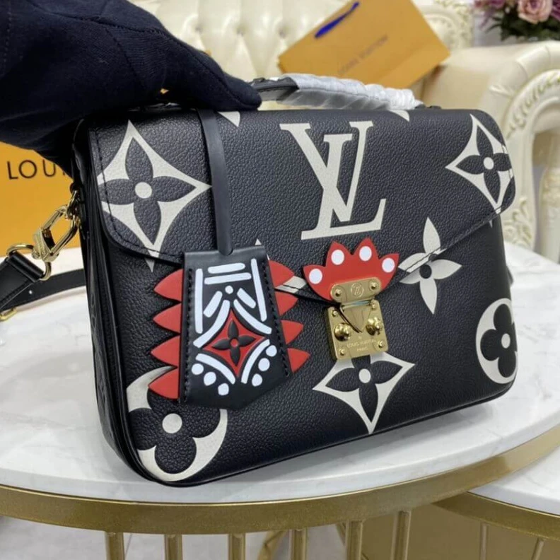 Louis vuitton locations Embossed Louis Vuitton LV Crafty Pochette Métis Black