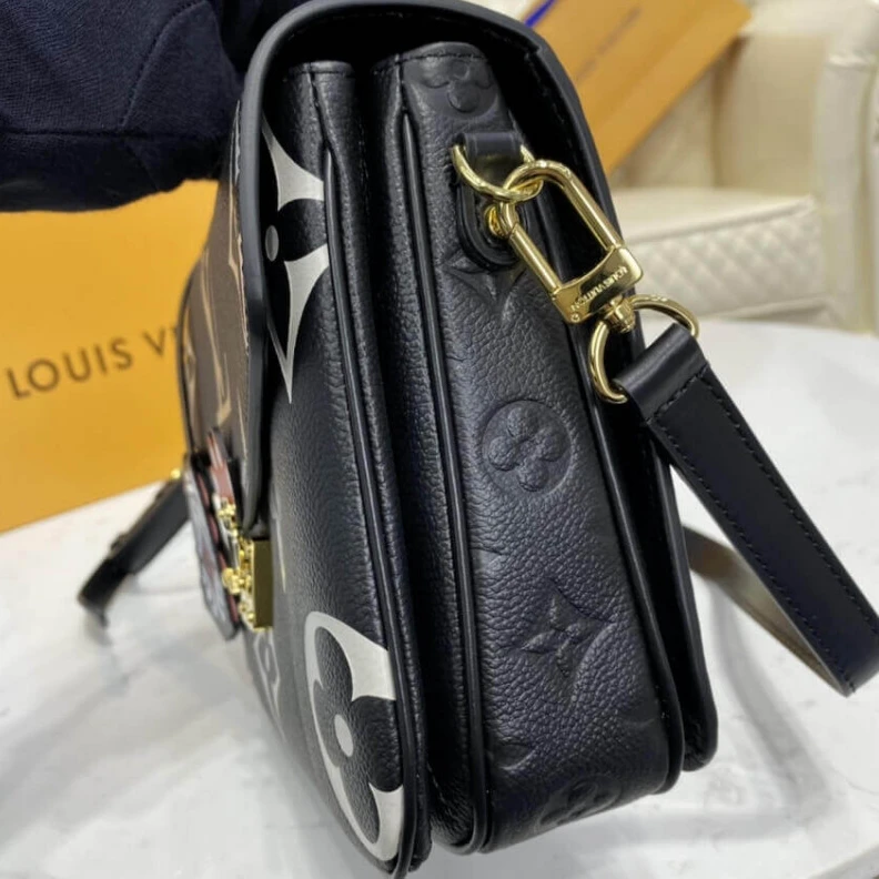 Louis vuitton locations Embossed Louis Vuitton LV Crafty Pochette Métis Black