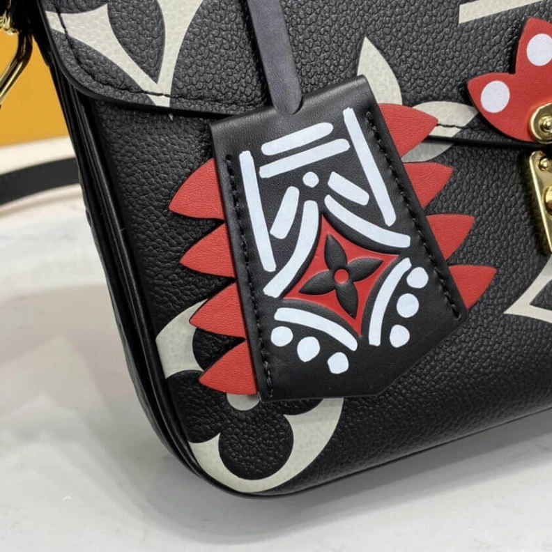 Louis vuitton locations Embossed Louis Vuitton LV Crafty Pochette Métis Black