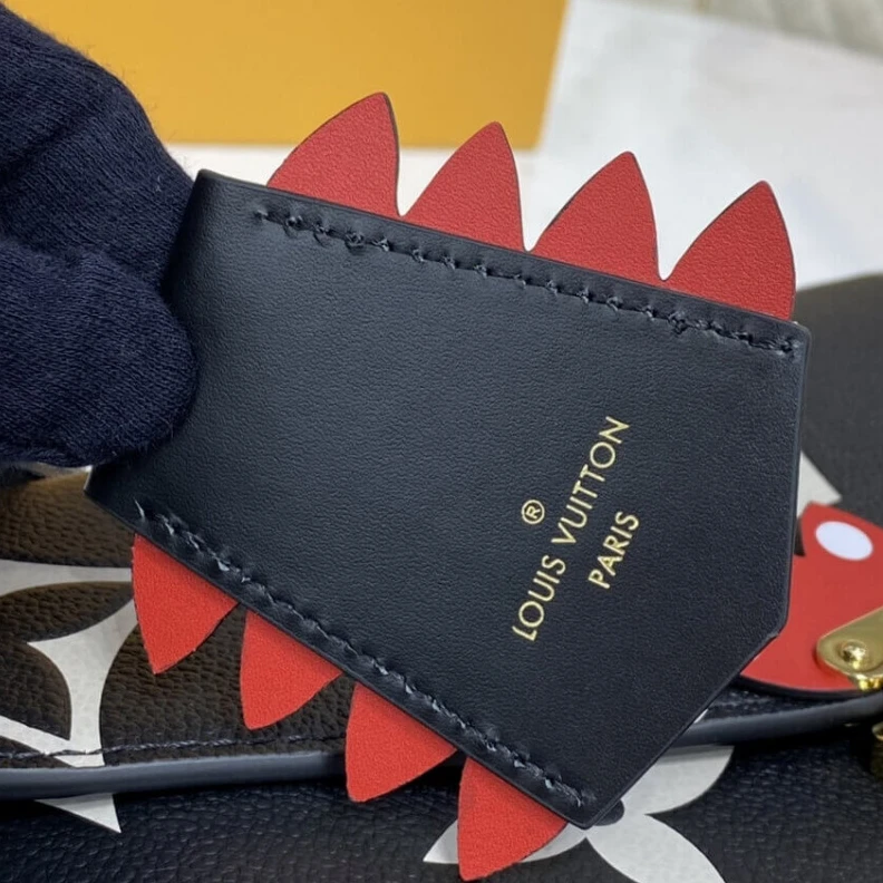 Louis vuitton locations Embossed Louis Vuitton LV Crafty Pochette Métis Black