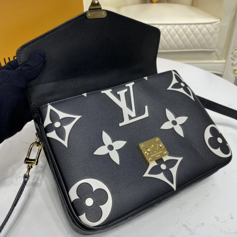 Louis vuitton locations Embossed Louis Vuitton LV Crafty Pochette Métis Black