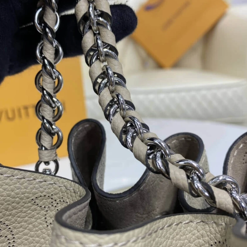Replica bags lv Microfibe Louis Vuitton Mahina Leather Bella Galet