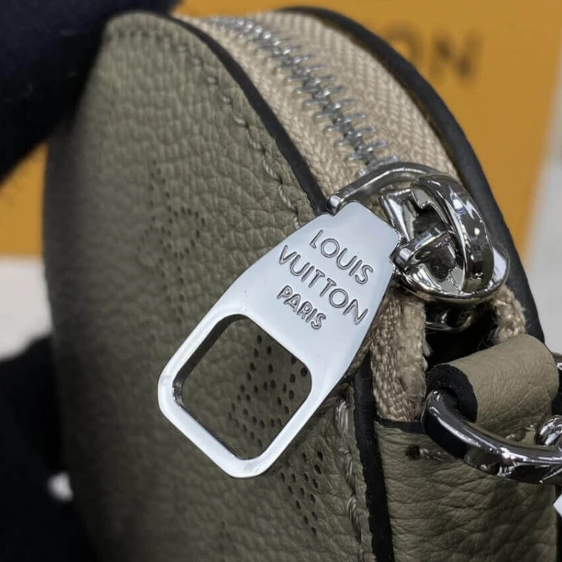 Replica bags lv Microfibe Louis Vuitton Mahina Leather Bella Galet