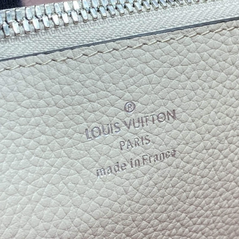 Top lv Brume Gra Louis Vuitton Mahina Leather Muria