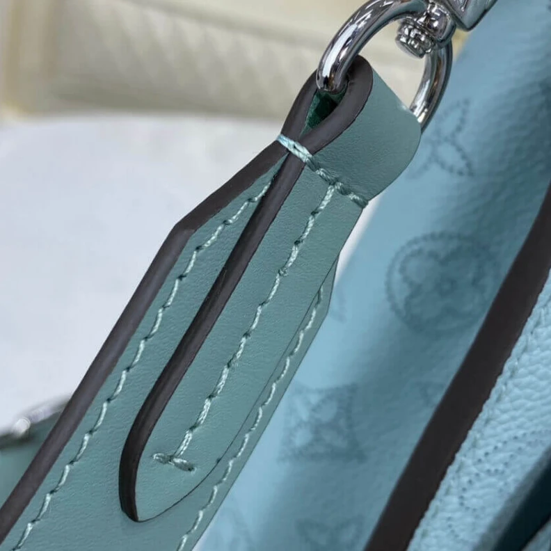Replica bags lv Strap dro Louis Vuitton Mahina Perforated Calf Leather Muria Vert Lagon
