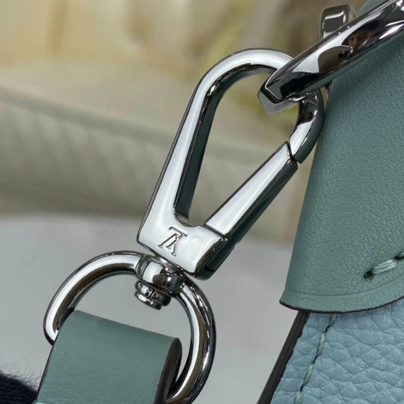 Replica bags lv Strap dro Louis Vuitton Mahina Perforated Calf Leather Muria Vert Lagon