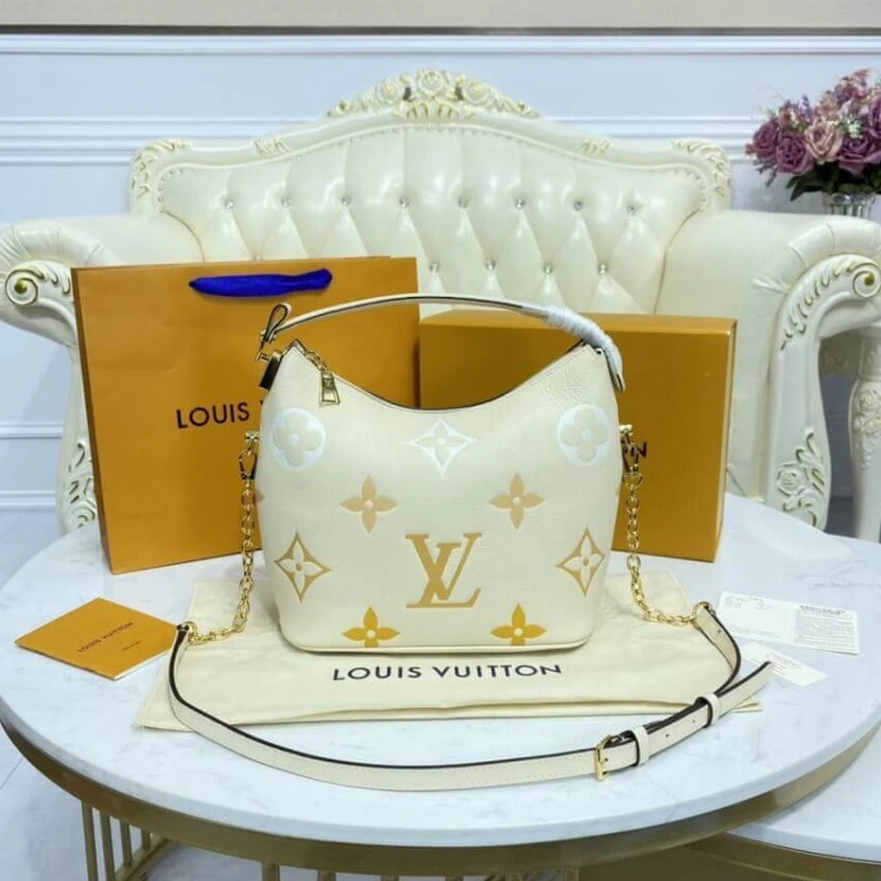 Replica bags lv Handle: S Louis Vuitton Marshmallow Hobo Bag Cream Saffron