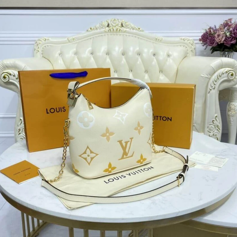 Replica bags lv Handle: S Louis Vuitton Marshmallow Hobo Bag Cream Saffron
