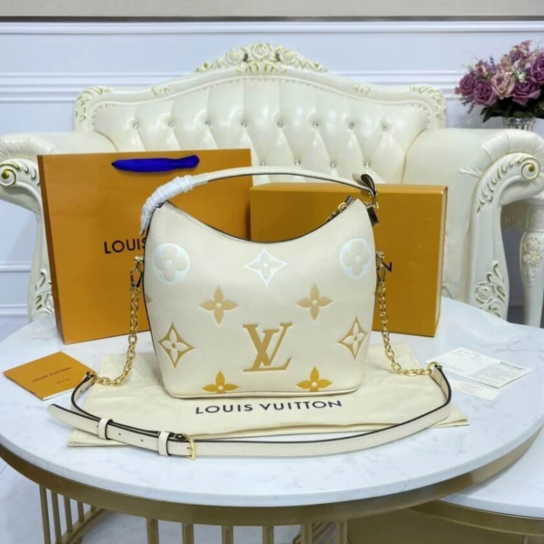 Replica bags lv Handle: S Louis Vuitton Marshmallow Hobo Bag Cream Saffron