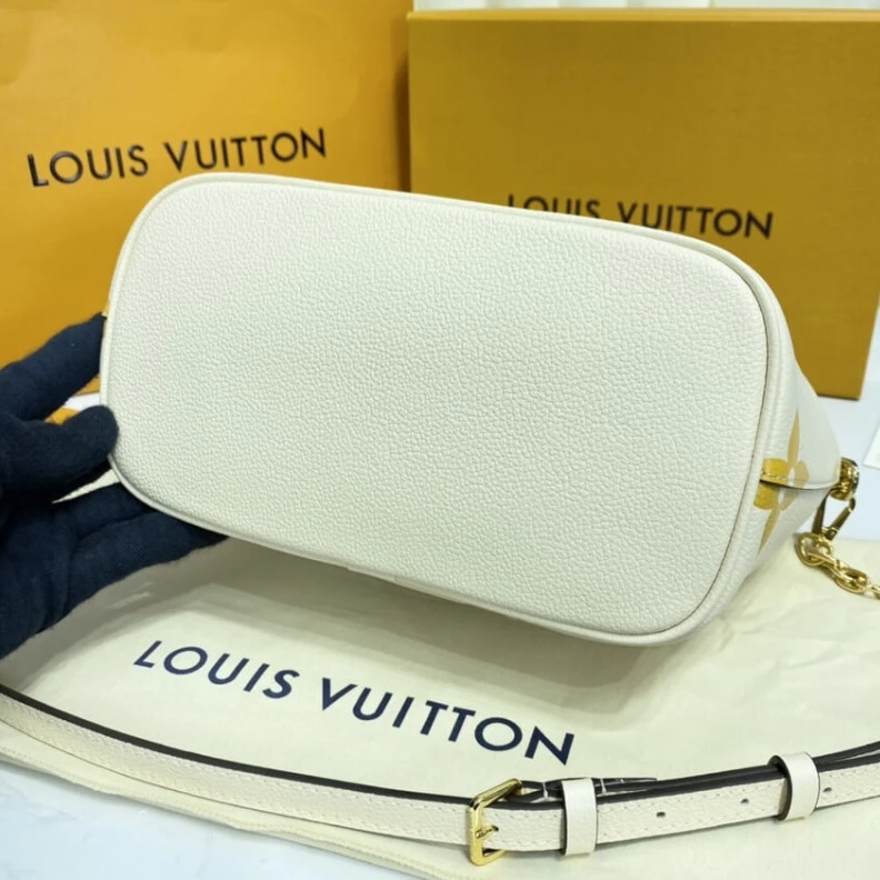 Replica bags lv Handle: S Louis Vuitton Marshmallow Hobo Bag Cream Saffron