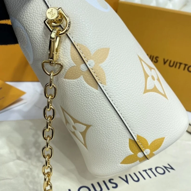 Replica bags lv Handle: S Louis Vuitton Marshmallow Hobo Bag Cream Saffron