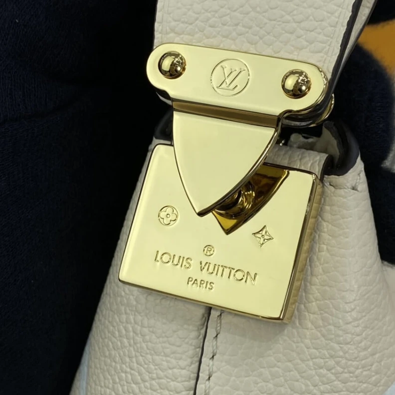 Replica bags lv Handle: S Louis Vuitton Marshmallow Hobo Bag Cream Saffron