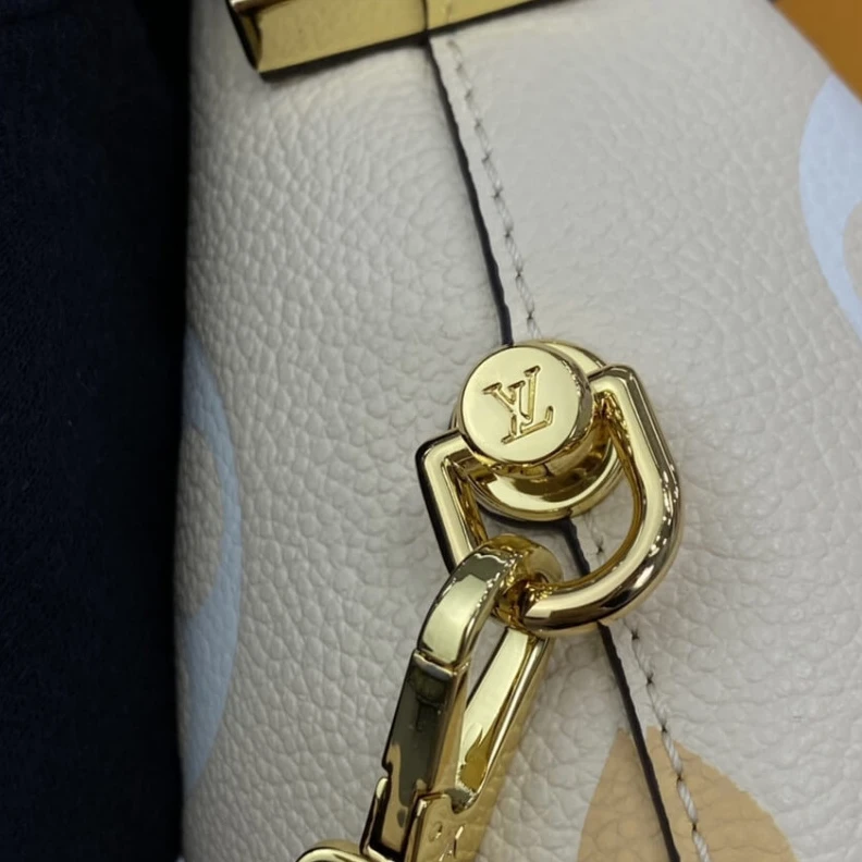 Replica bags lv Handle: S Louis Vuitton Marshmallow Hobo Bag Cream Saffron
