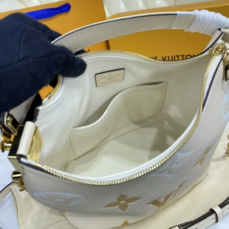 Replica bags lv Handle: S Louis Vuitton Marshmallow Hobo Bag Cream Saffron