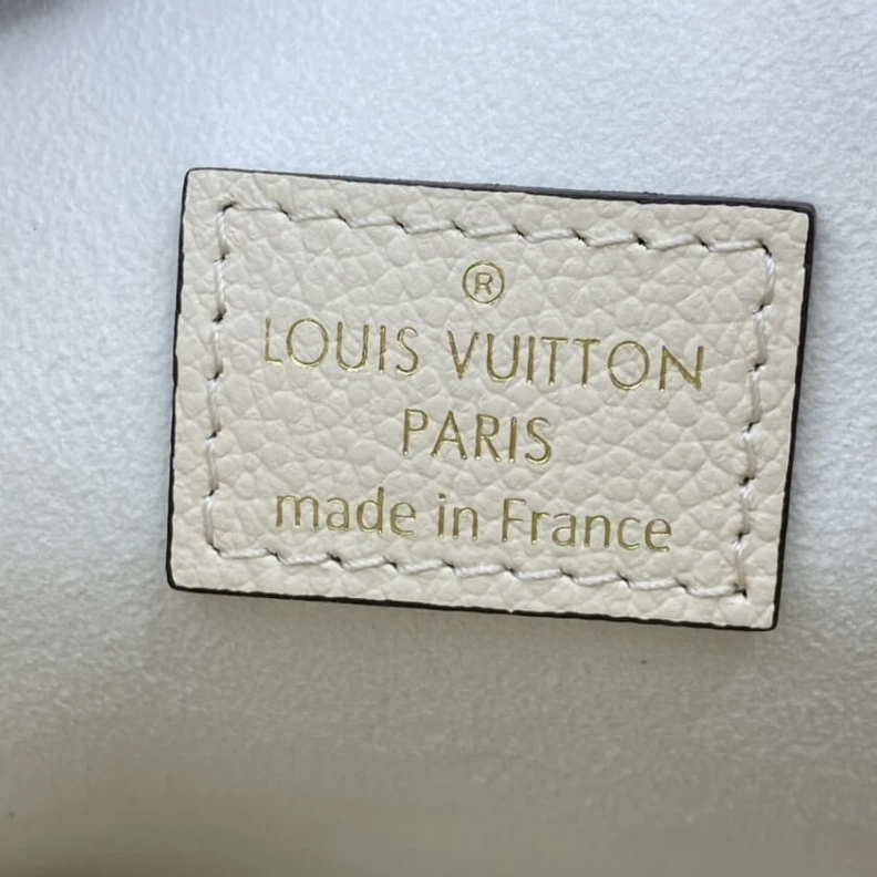 Replica bags lv Handle: S Louis Vuitton Marshmallow Hobo Bag Cream Saffron