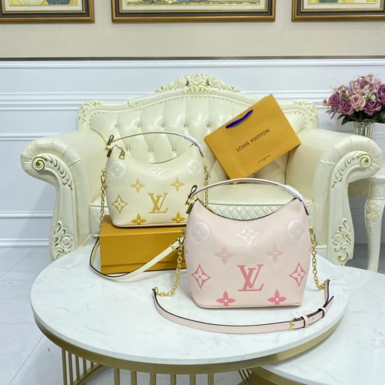 Replica bags lv Handle: S Louis Vuitton Marshmallow Hobo Bag Cream Saffron