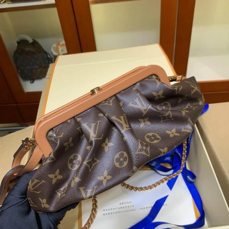 Louis vuitton locations Removable Louis Vuitton Monogram Boursicot EW Pouch Bag