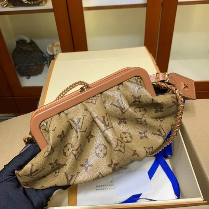 Louis vuitton locations Removable Louis Vuitton Monogram Boursicot EW Pouch Bag